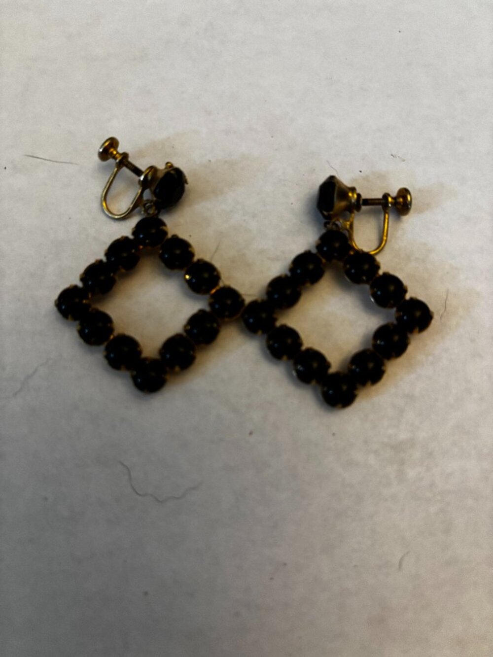Screw back clip earrings gold tone black glass diamond shape dangles